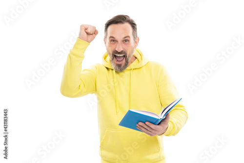 happy adult guy reading planner. agenda. literature education. mature man with beard hold notebook