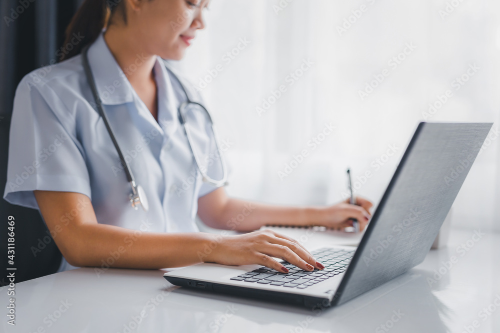 Doctor woman working with laptop computer in the clinic. Doctor woman working with laptop computer in the clinic.