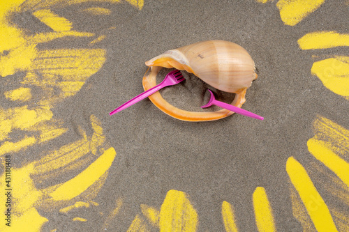 Dinner prepared of sand served in empty shell. An idea for advertising. The concept of ecology.