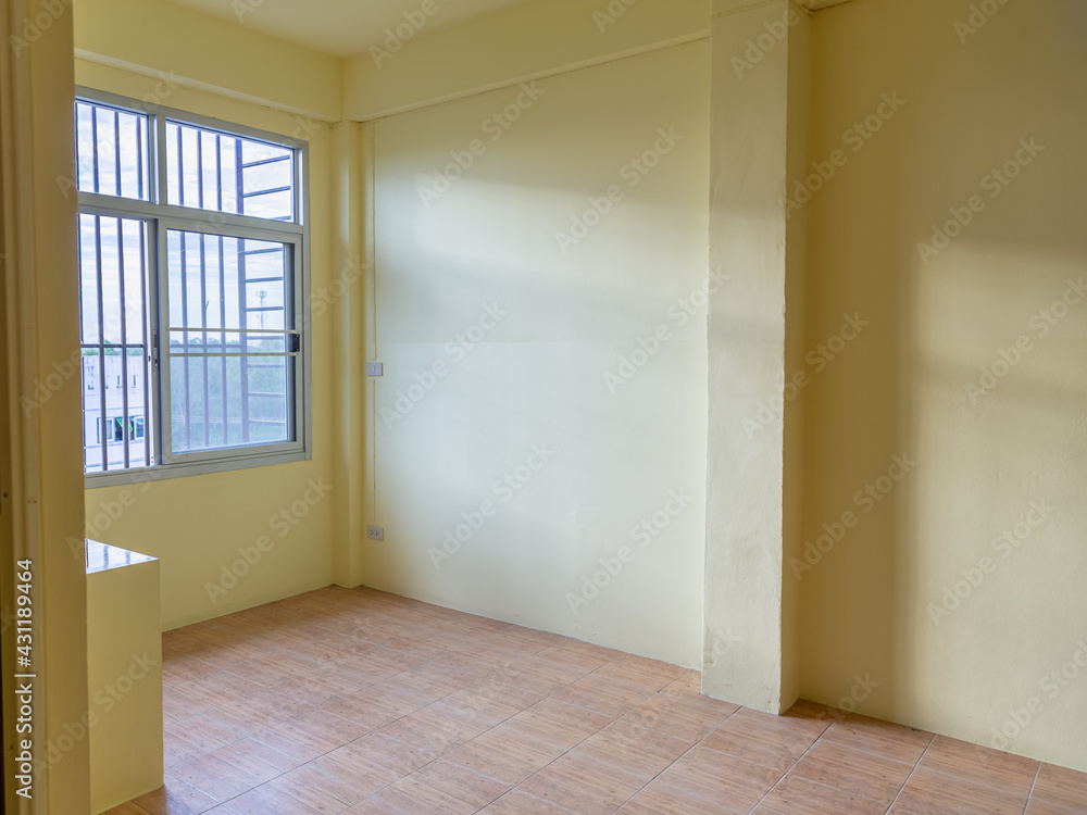 Empty room with a window and sun light shadow Empty room with a window and sun light shadow