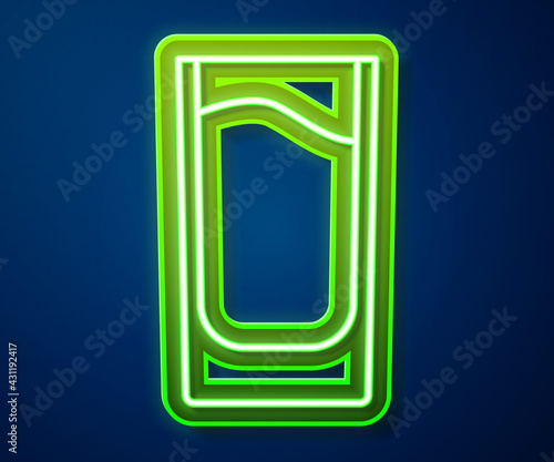 Glowing neon line Shot glass icon isolated on blue background. Vector