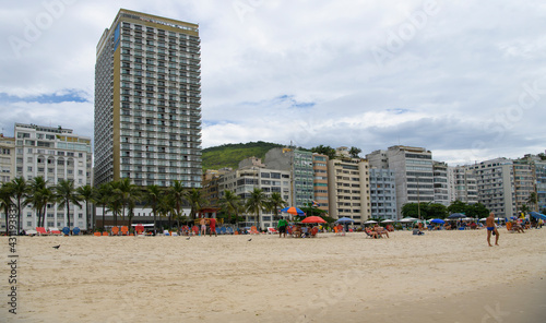  Citizens sunbathe on the beach of Copacabana © aleks