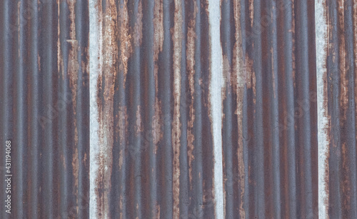 Rusted zinc  taken as a background behind the mill.