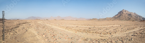 Barren rocky desert landscape in hot climate