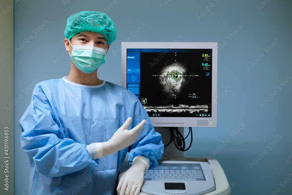 Doctor wears sterile uniform and uses Intravascular ultrasound imaging (IVUS) machine at cardiac