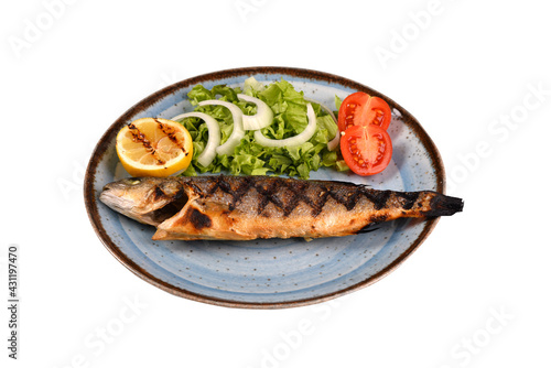 grilled sea bass and vegetables. It is served with various sauces. white background 