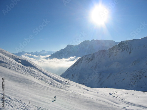 Sunny mountain ski slopes