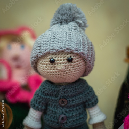 Knitted boy in a hat.