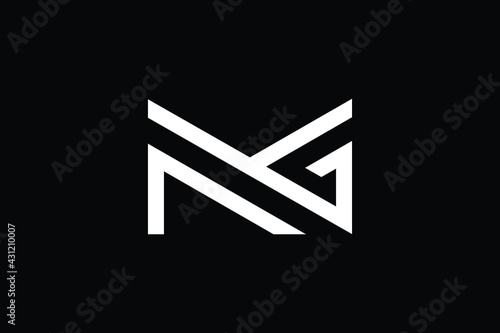 MG logo letter design on luxury background. GM logo monogram initials letter concept. MG icon logo design. GM elegant and Professional letter icon design on black background. M G GM MG