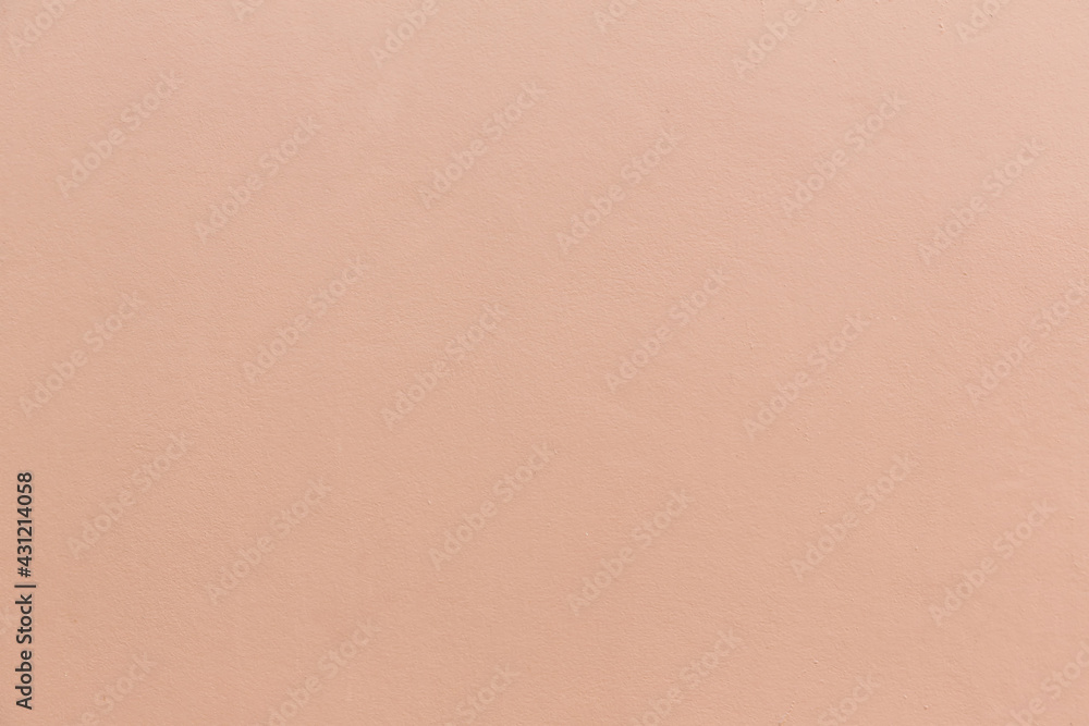 ฺBrown wall texture. Texture of the wall for background. Brown wall soft light background. The structure of an old brown cement surface. Flesh color