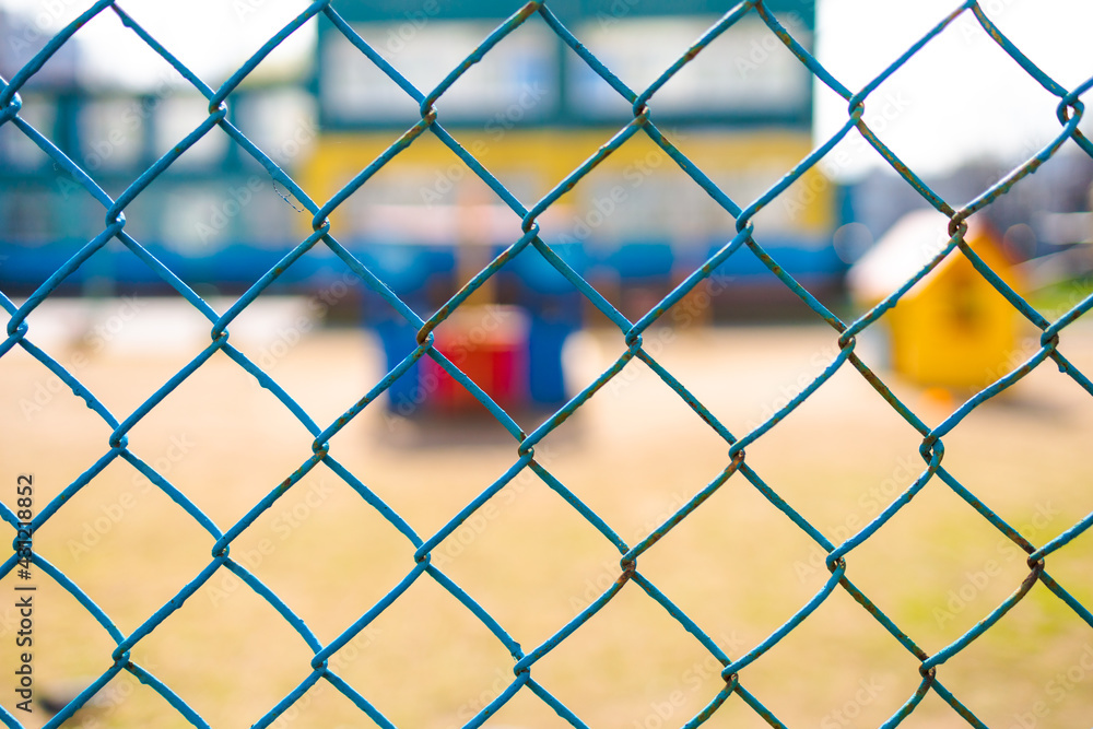 chain-link of blue color close-up, background is blured chain-link of blue color close-up, background is blured