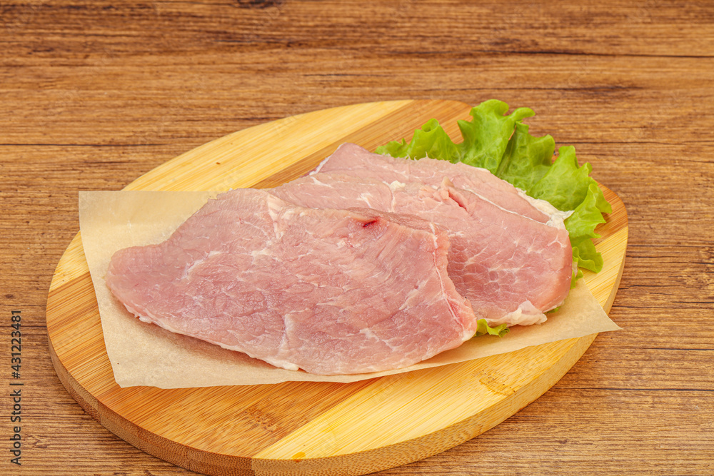 Raw pork steak for cooking