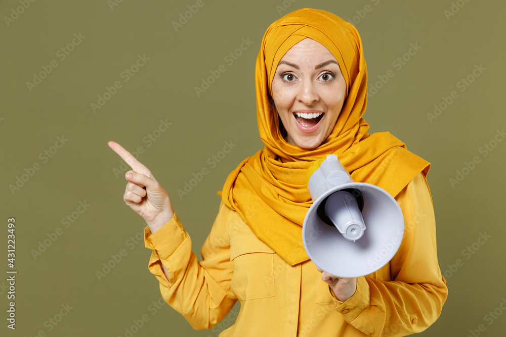 Young fun arabian asian muslim woman in abaya hijab yellow clothes ...