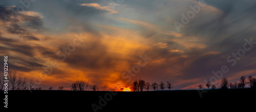 Sunset view in Roprachtice village in Krkonose mountains with color sky photo