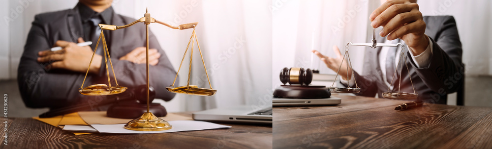Business and lawyers discussing contract papers with brass scale on desk in office. Law, legal services, advice, justice and law concept picture with film grain effect Business and lawyers discussing contract papers with brass scale on desk in office. Law, legal services, advice, justice and law concept picture with film grain effect