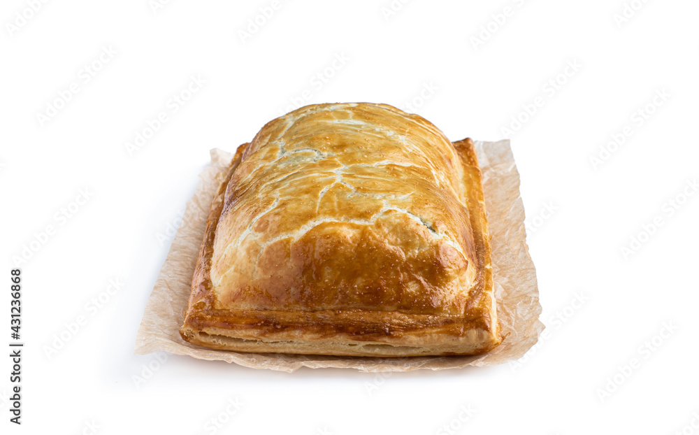 Homemade salmon wellington with spinach and mushrooms isolated on white