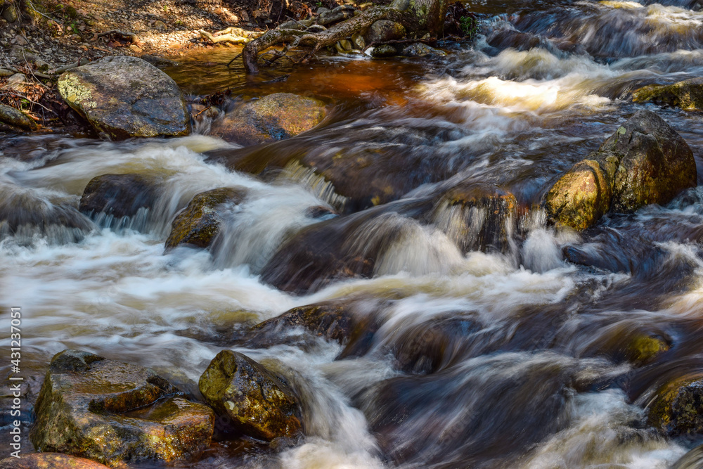 water cascading over rock in willard brook water cascading over rock in willard brook