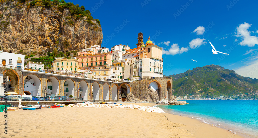 Morning view of Amalfi cityscape on coast line of mediterranean sea, Italy