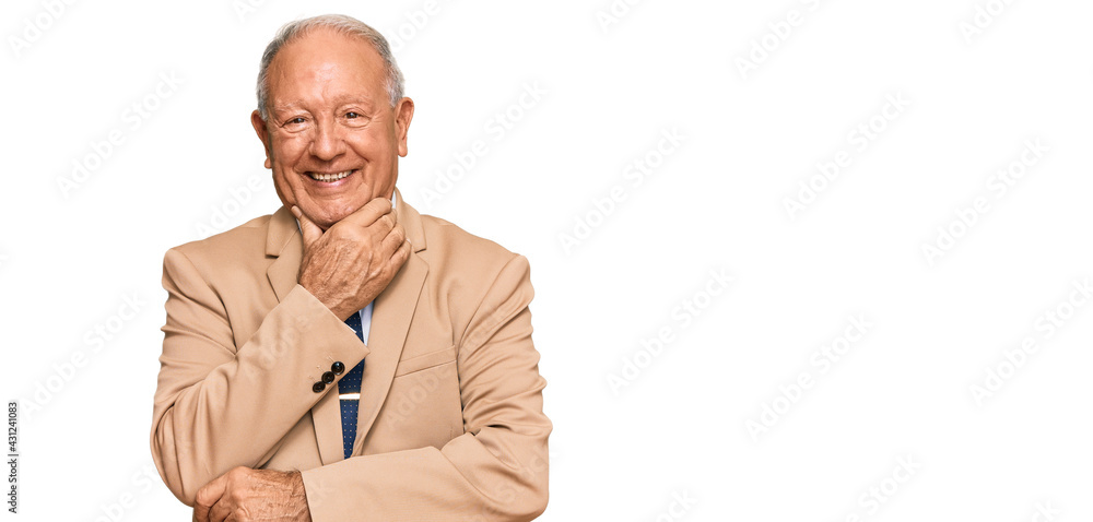 Senior caucasian man wearing business suit and tie looking confident at the camera smiling with crossed arms and hand raised on chin. thinking positive. Senior caucasian man wearing business suit and tie looking confident at the camera smiling with crossed arms and hand raised on chin. thinking positive.