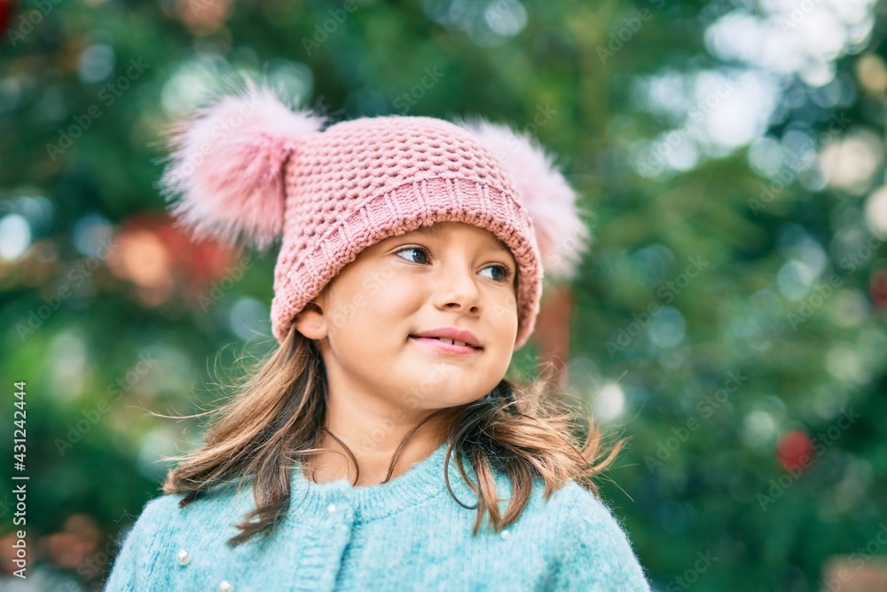 Adorable caucasian child girl smiling happy standing at the park. Adorable caucasian child girl smiling happy standing at the park.