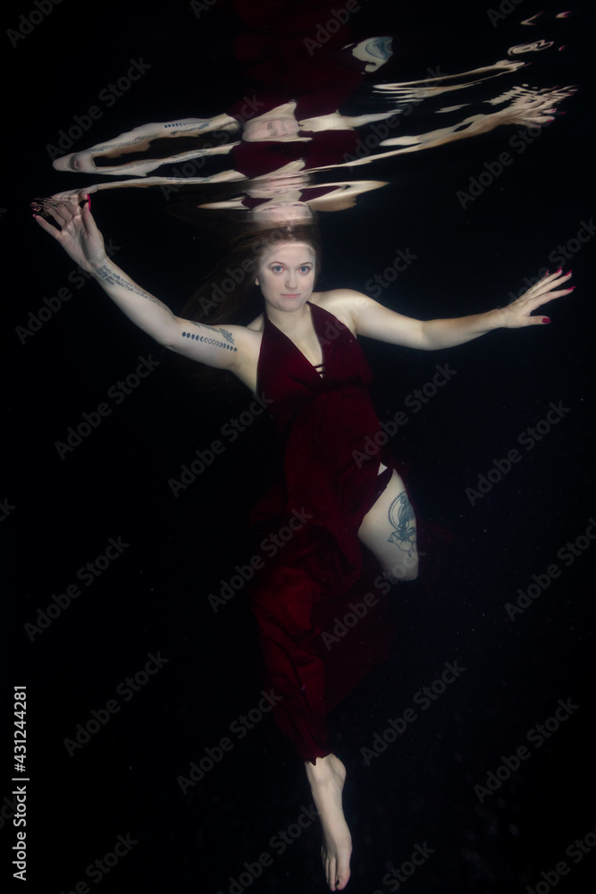 red dancer underwater