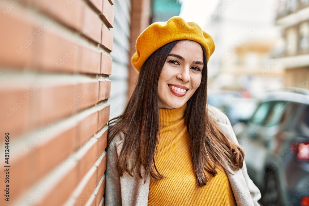 Young hispanic girl smiling happy standing at the city. Young hispanic girl smiling happy standing at the city.