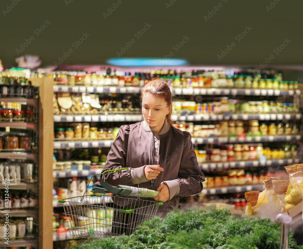 Woman buying fruits and vegetables  at the market