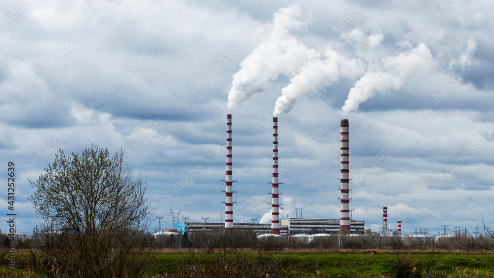 Panoramic view of power station Lukomlskaya Gres. Chimneys with smoke of power plant. Ecological problem. Environmental pollution concept. Panoramic view of power station Lukomlskaya Gres. Chimneys with smoke of power plant. Ecological problem. Environmental pollution concept.