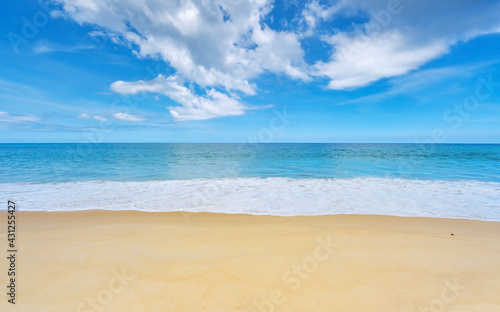 Summer background of Beautiful sandy beach Wave crashing on sandy shore Landscape nature view Romantic ocean bay with blue water and clear blue sky over sea at Phuket island Thailand