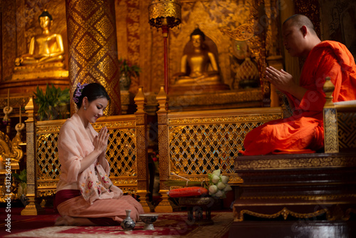 Making merit with monks It is one of the rituals of the Buddhist religion.