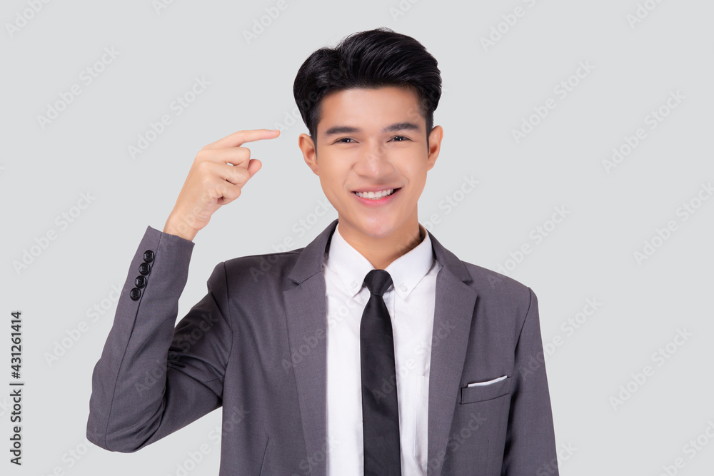 Portrait young asian business man in suit with smart thinking idea with intelligent isolated on white background, businessman standing and planning for success, manager or executive pointing head. Portrait young asian business man in suit with smart thinking idea with intelligent isolated on white background, businessman standing and planning for success, manager or executive pointing head.