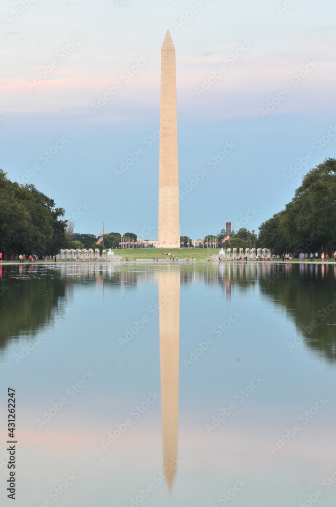 Washington Monument and its reflection over the reflection pool in National Mall - Washington D.C. United States of America	