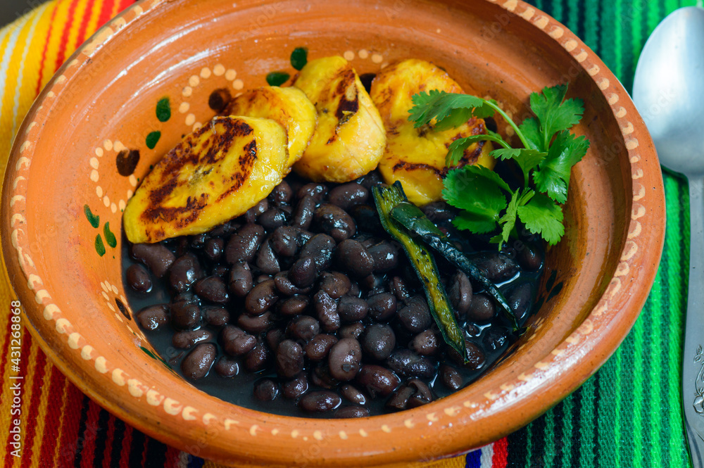 Traditional Mexican and Central American breakfast. Black beans and plantain
