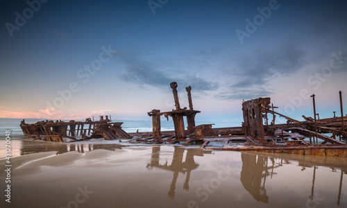 Canvas Print Wreck of the Steam Ship SS Maheno covered by sand on the beach