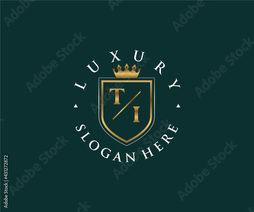 Initial TI Letter Royal Luxury Logo template in vector art for Restaurant, Royalty, Boutique, Cafe, Hotel, Heraldic, Jewelry, Fashion and other vector illustration.