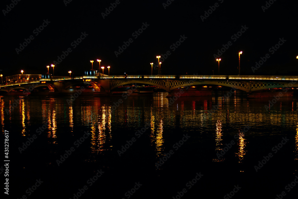 view of St. Petersburg at night, the Neva river and lights