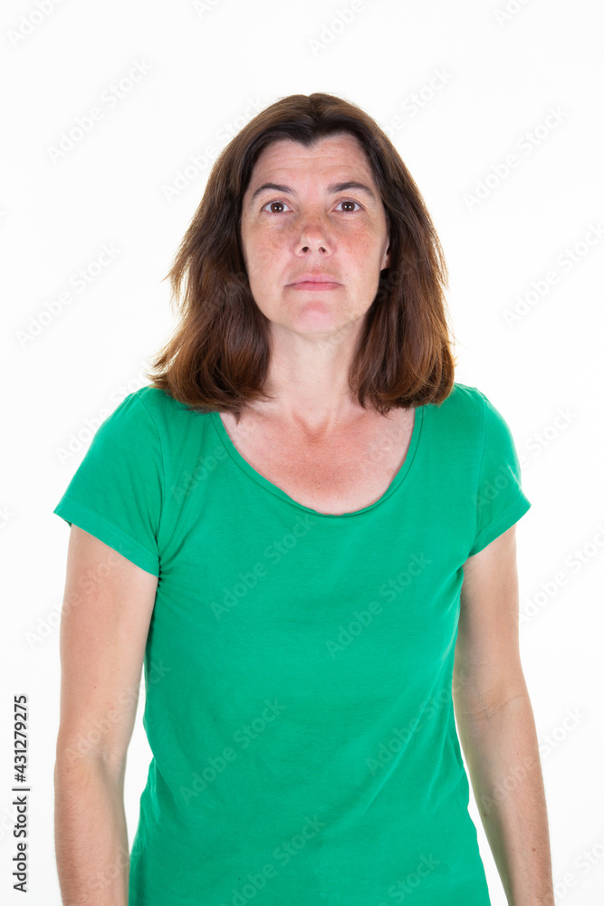 Woman Head shot Portrait middle aged female in green shirt over white background Woman Head shot Portrait middle aged female in green shirt over white background