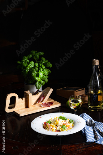 Tagliatelle with gorgonzola masarpone sauce and ham. photo