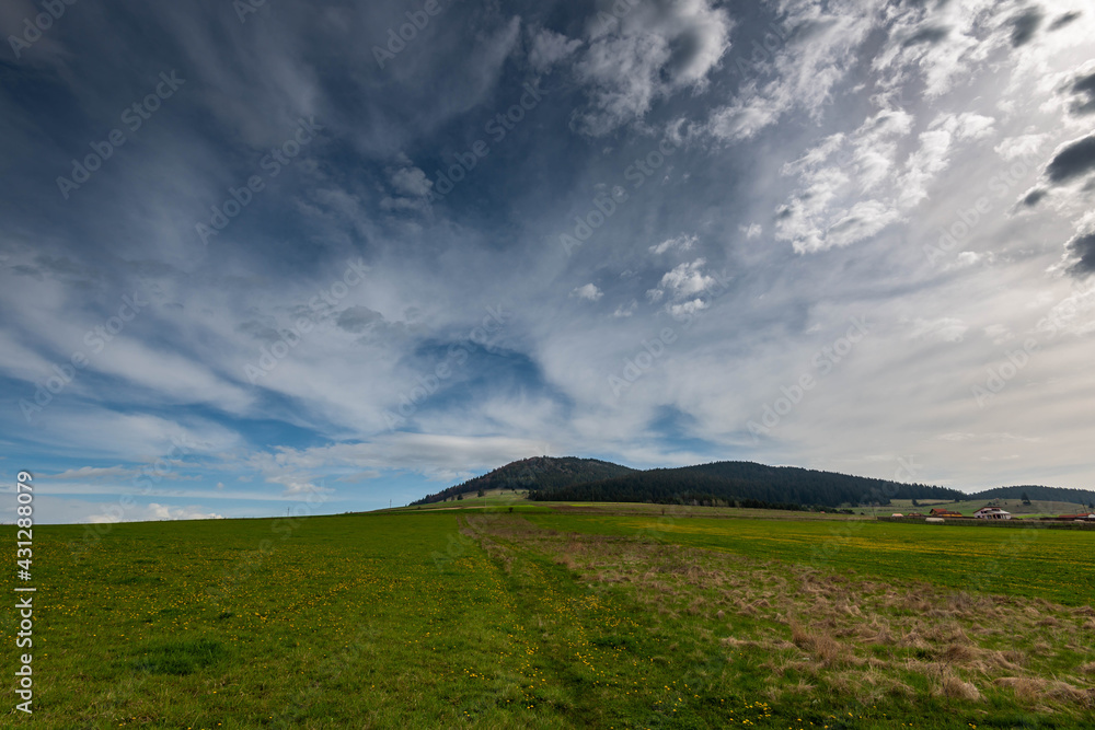Mount Csiksomlyo in hungarian, Sumuleu Ciuc in romanian, at early spring, one of the most visited places in Eastern Europe by catholic pilgrims. Mount Csiksomlyo in hungarian, Sumuleu Ciuc in romanian, at early spring, one of the most visited places in Eastern Europe by catholic pilgrims.