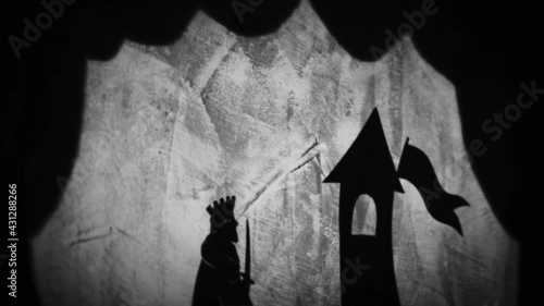 Vintage animation, shadow theatre on a wall. Pantomime, fantasy story. Halloween scene, black and white storytelling. Classic fable for children, creepy puppets.