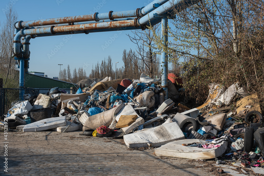 Obraz premium Waste illegally disposed of in nature, Litter consists of waste products that have been discarded incorrectly, without consent, at an unsuitable location.