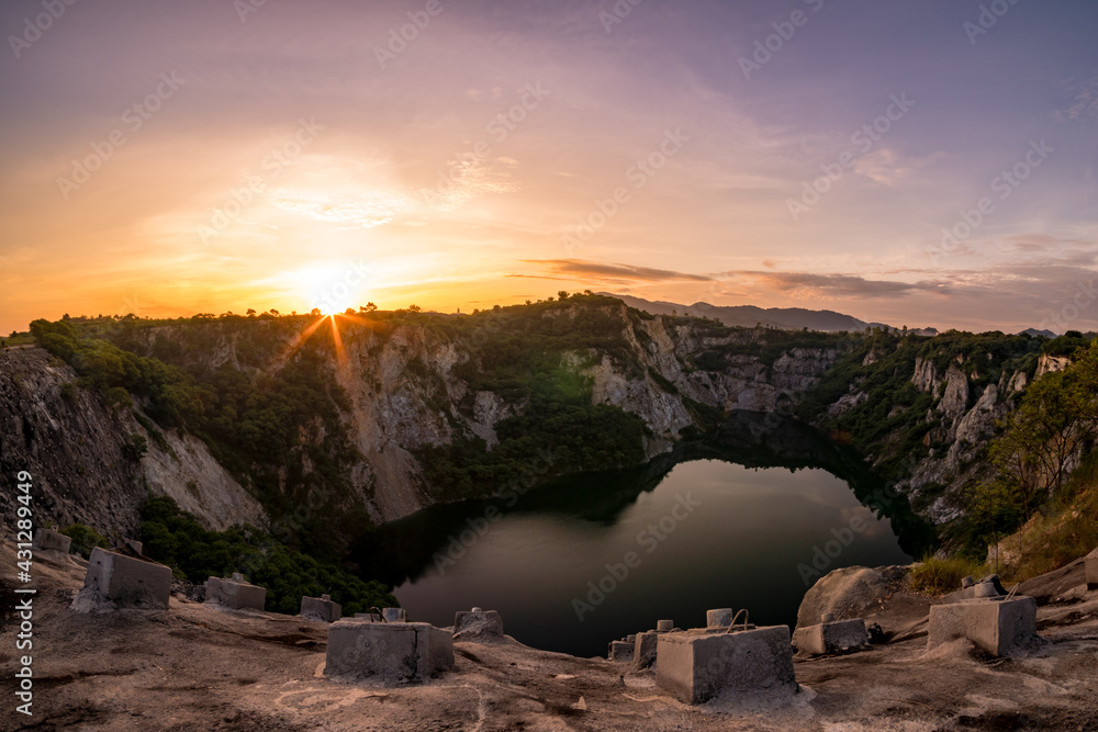 Sunrise at the Grand Canyon in Chonburi, Thailand...The well is surrounded by limestone rocks.