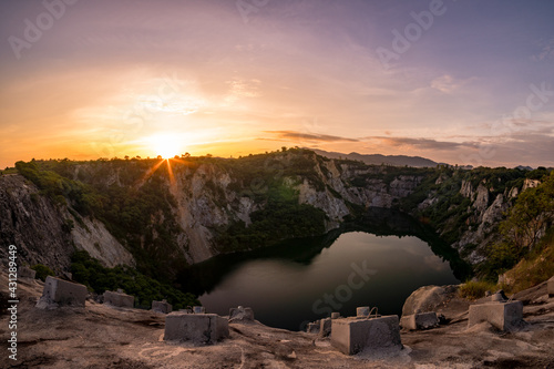 Sunrise at the Grand Canyon in Chonburi, Thailand...The well is surrounded by limestone rocks.