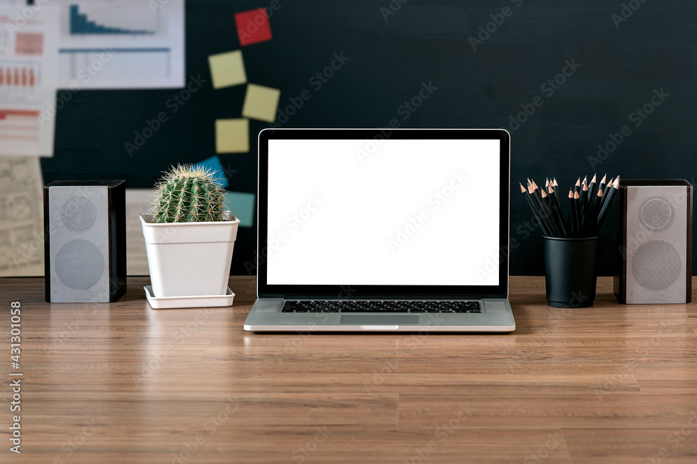 Back to school concept. Mockup blank screen laptop computer and supplies on wooden table. Back to school concept. Mockup blank screen laptop computer and supplies on wooden table.