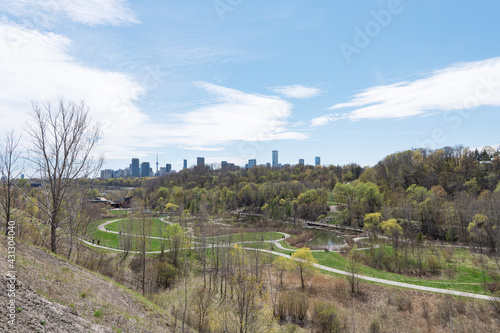 Toronto City Skyline on a sunny day from Don Valley Brick Works Park in Spring