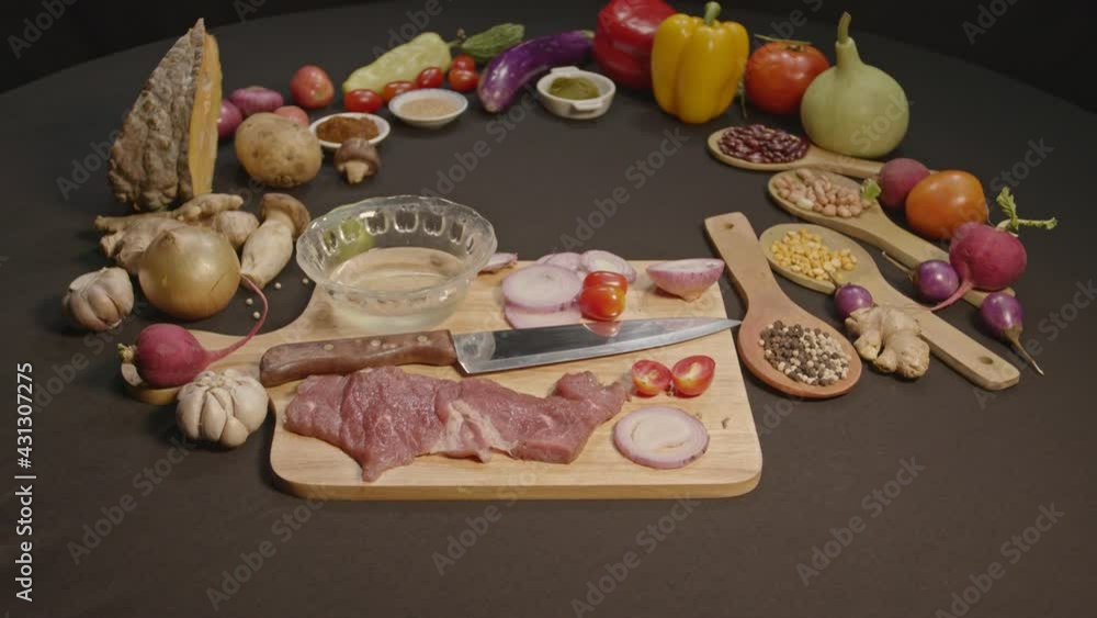 Fresh food and cooking equipment preparation on a black table.high quality 4K video Fresh food and cooking equipment preparation on a black table.high quality 4K video