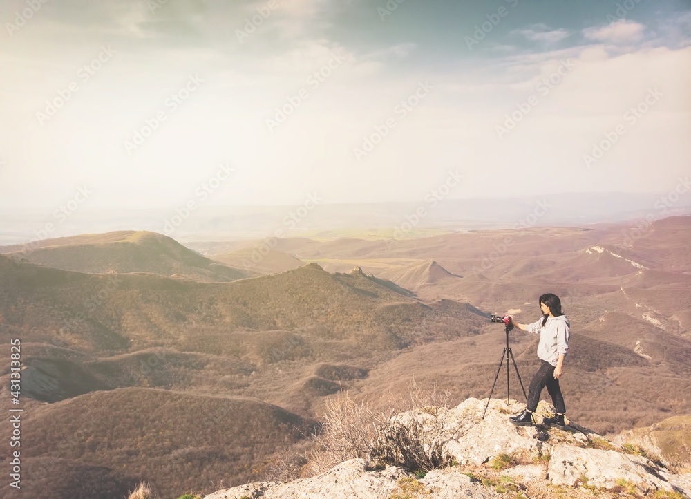 Aerial view attractive caucasian woman photographing mountains with DSLR enjoy photography. Content creator amateur photographer Aerial view attractive caucasian woman photographing mountains with DSLR enjoy photography. Content creator amateur photographer
