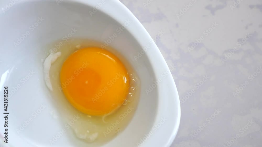 egg white and yolk in the plate separated from the shell, egg white and yolk in the plate separated from the shell,