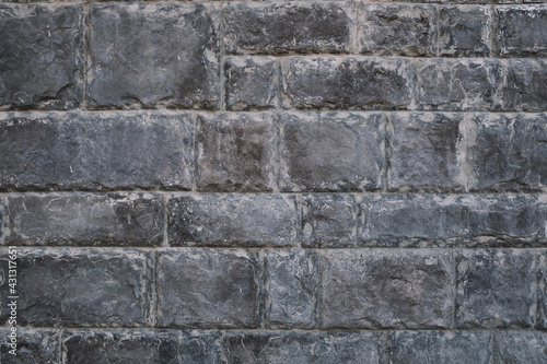 The texture of the old gray wall, stone wall