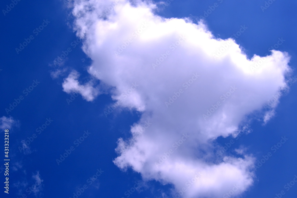 White cloud in the blue sky. Natural background